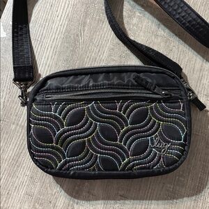 Lug crossbody